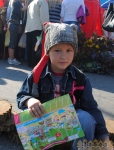 Мальчик-казак с картой Покровской ярмарки в Запорожье